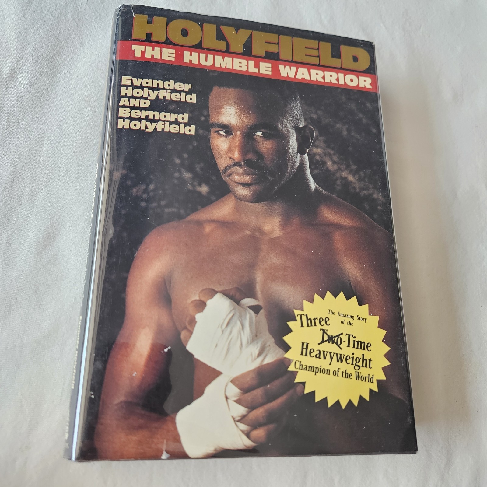 Signed: Evander Holyfield – The Humble Warrior Boxing 1996 Hard Cover Book HC DJ