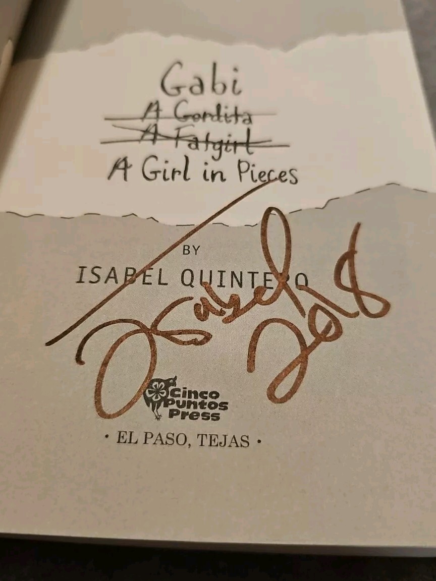 Gabi, A Girl in Pieces Autographed by Isabel Quintero in 2018.