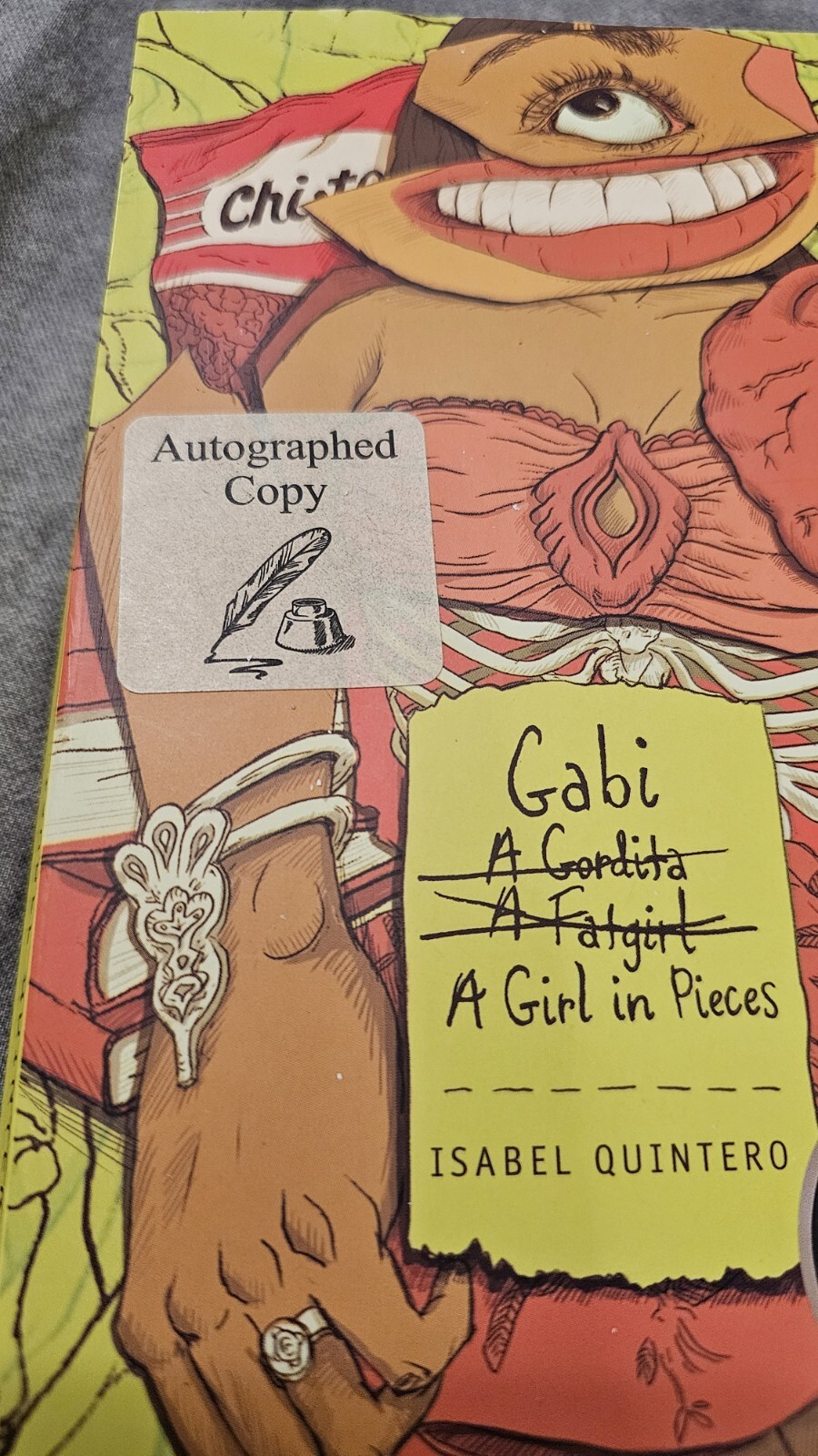 Gabi, A Girl in Pieces Autographed by Isabel Quintero in 2018.