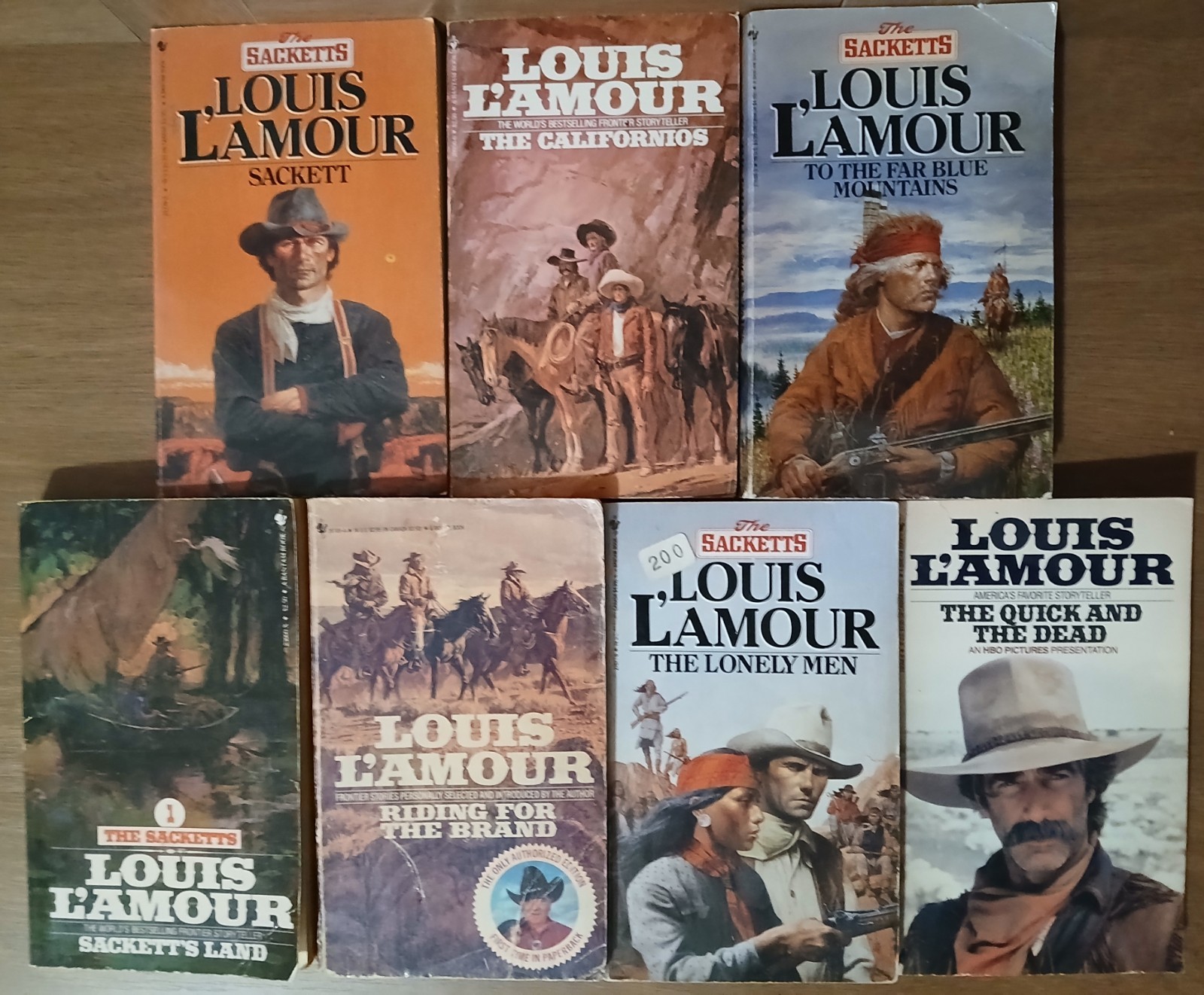 18 Vintage paperback western novels by the author Louis L’Amour.