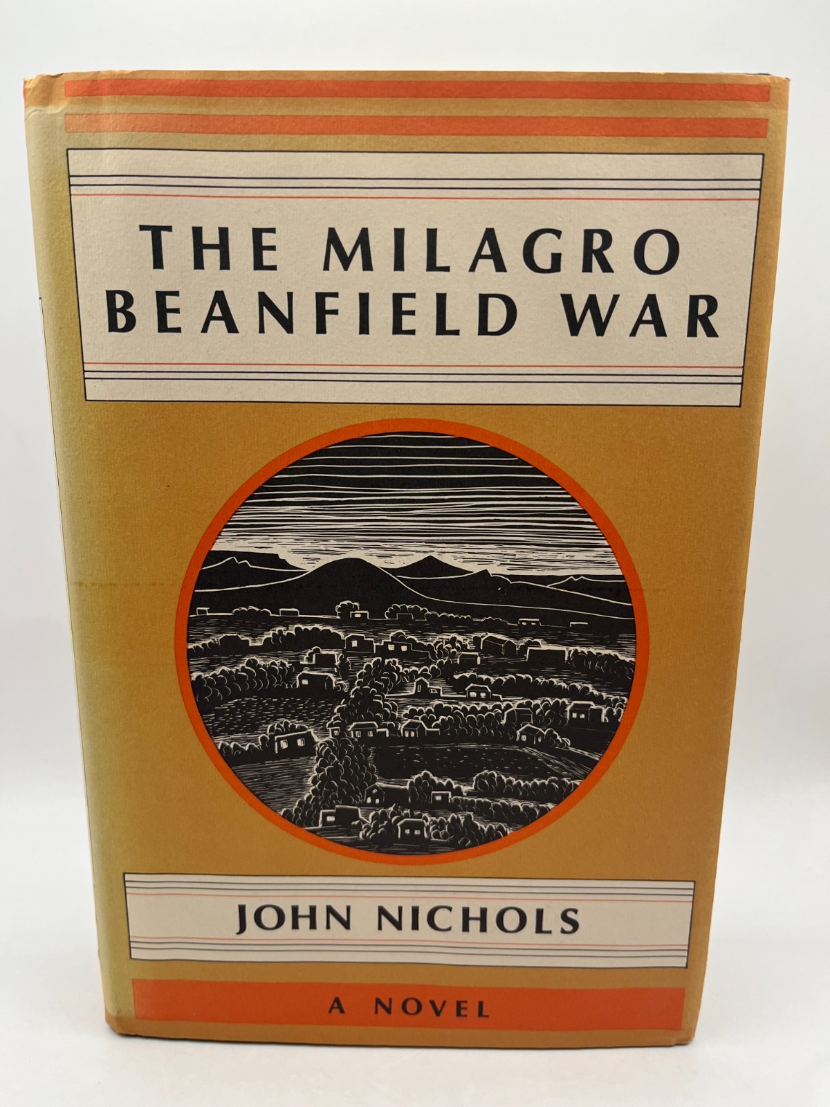 John Nichols / The Milagro Beanfield War 1st Edition 1974 hardcover ex-lib