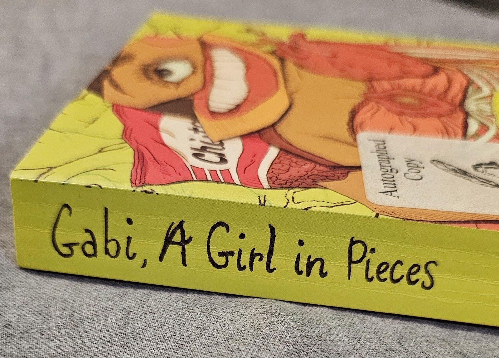 Gabi, A Girl in Pieces Autographed by Isabel Quintero in 2018.