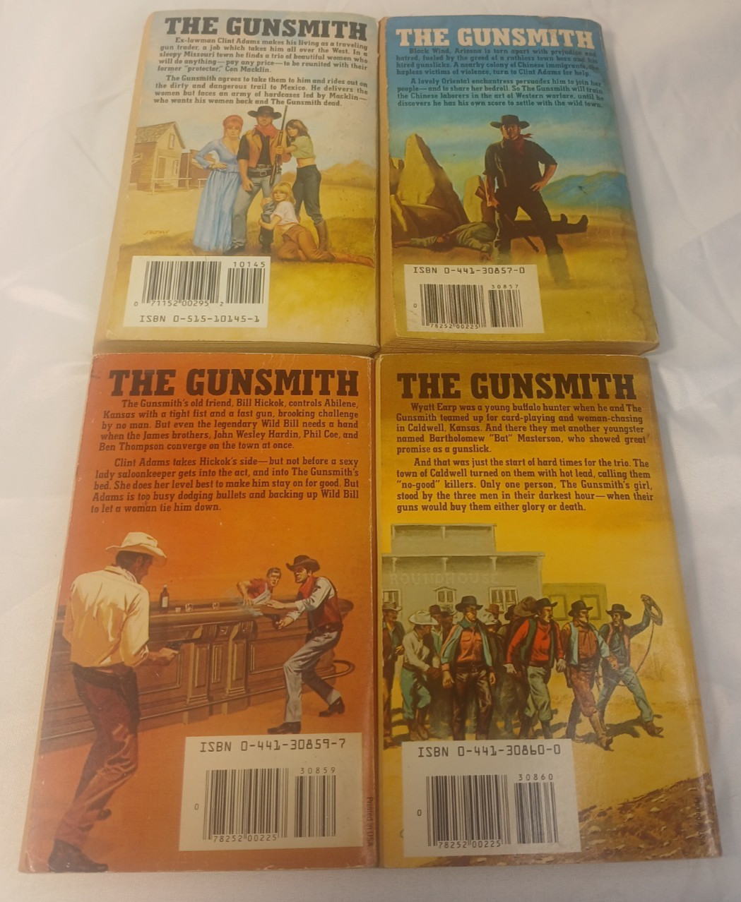 Lo of 9 The Gunsmith – J. R. Robert – Books 1-2, 4-6, 49 ,50, 52, and 55
