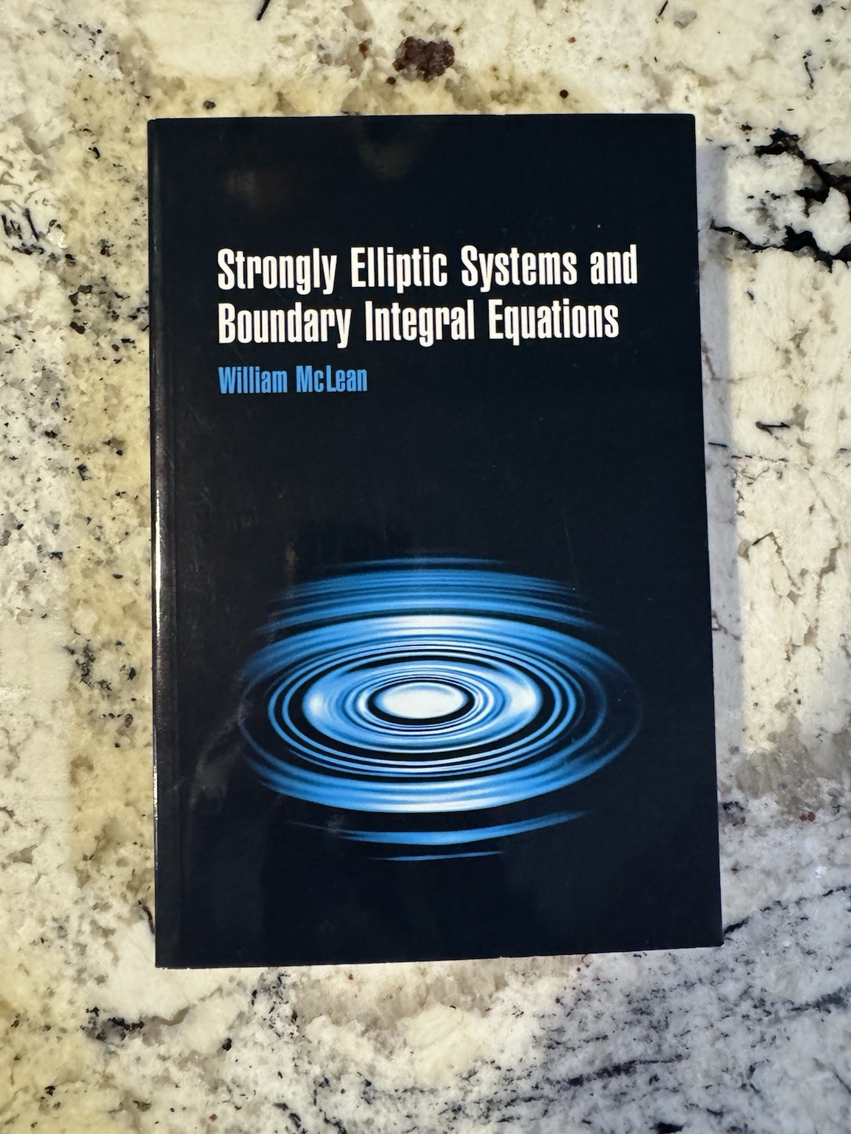 Strongly Elliptic Systems and Boundary Integral Equations