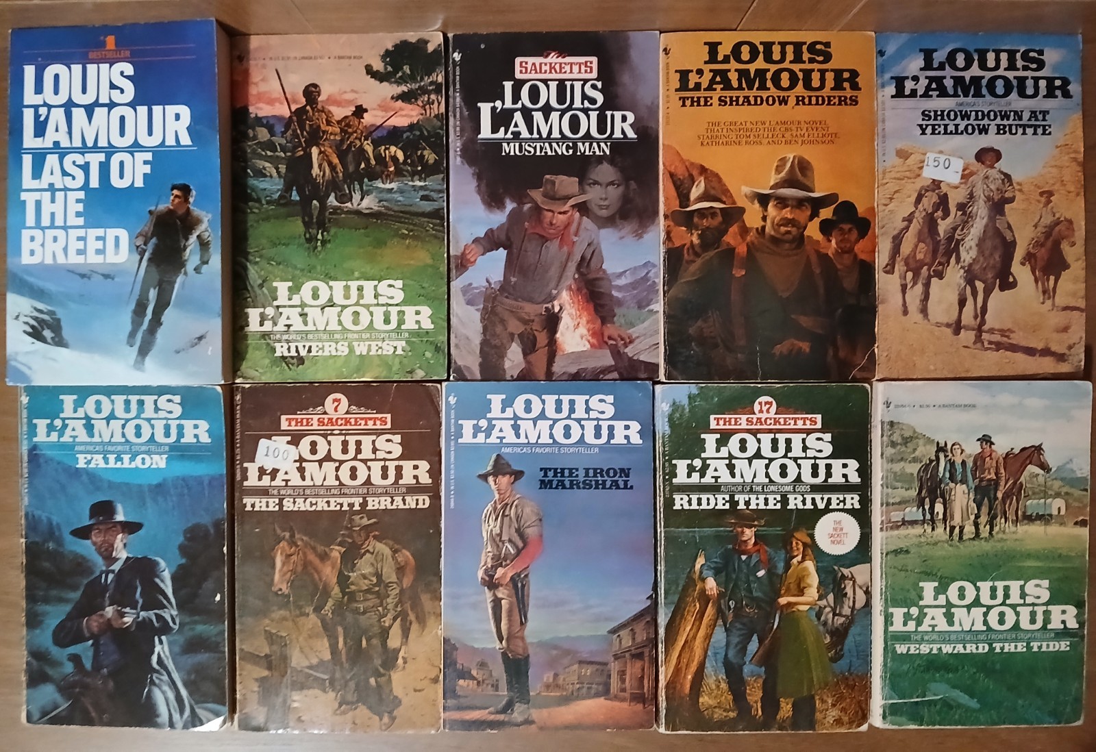 18 Vintage paperback western novels by the author Louis L’Amour.