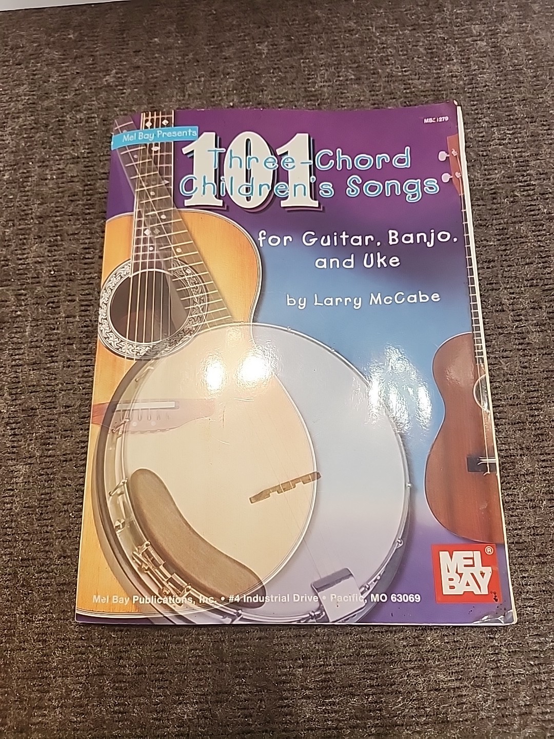 101 Three-Chord Children’s Songs for Guitar, Banjo and Uke by Larry McCabe.