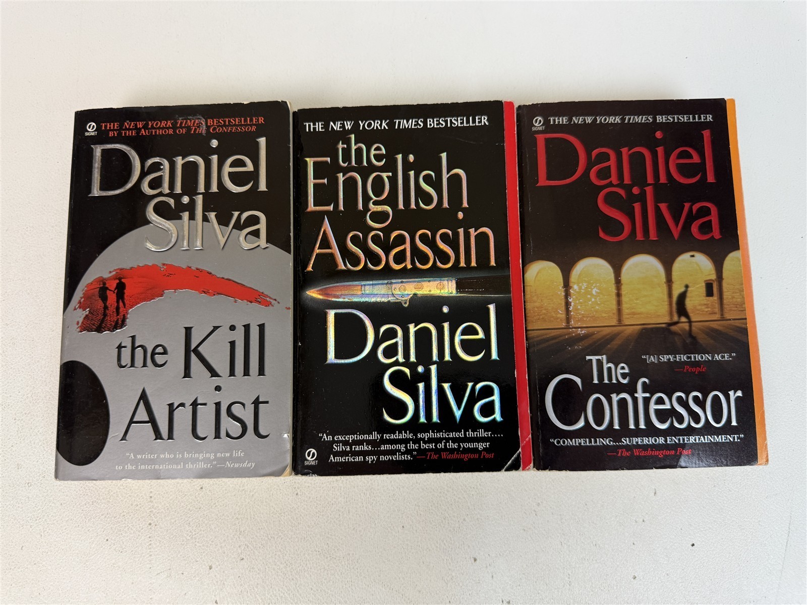Daniel Silva Lot 23 Paperbacks including 20 Gabriel Allon series