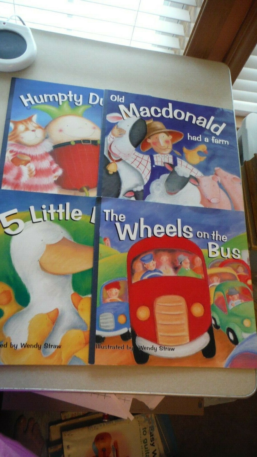 Set of 4 Nursery Rhyme books by Wendy Straw, Humpty, Old MacDonald, Wheels on