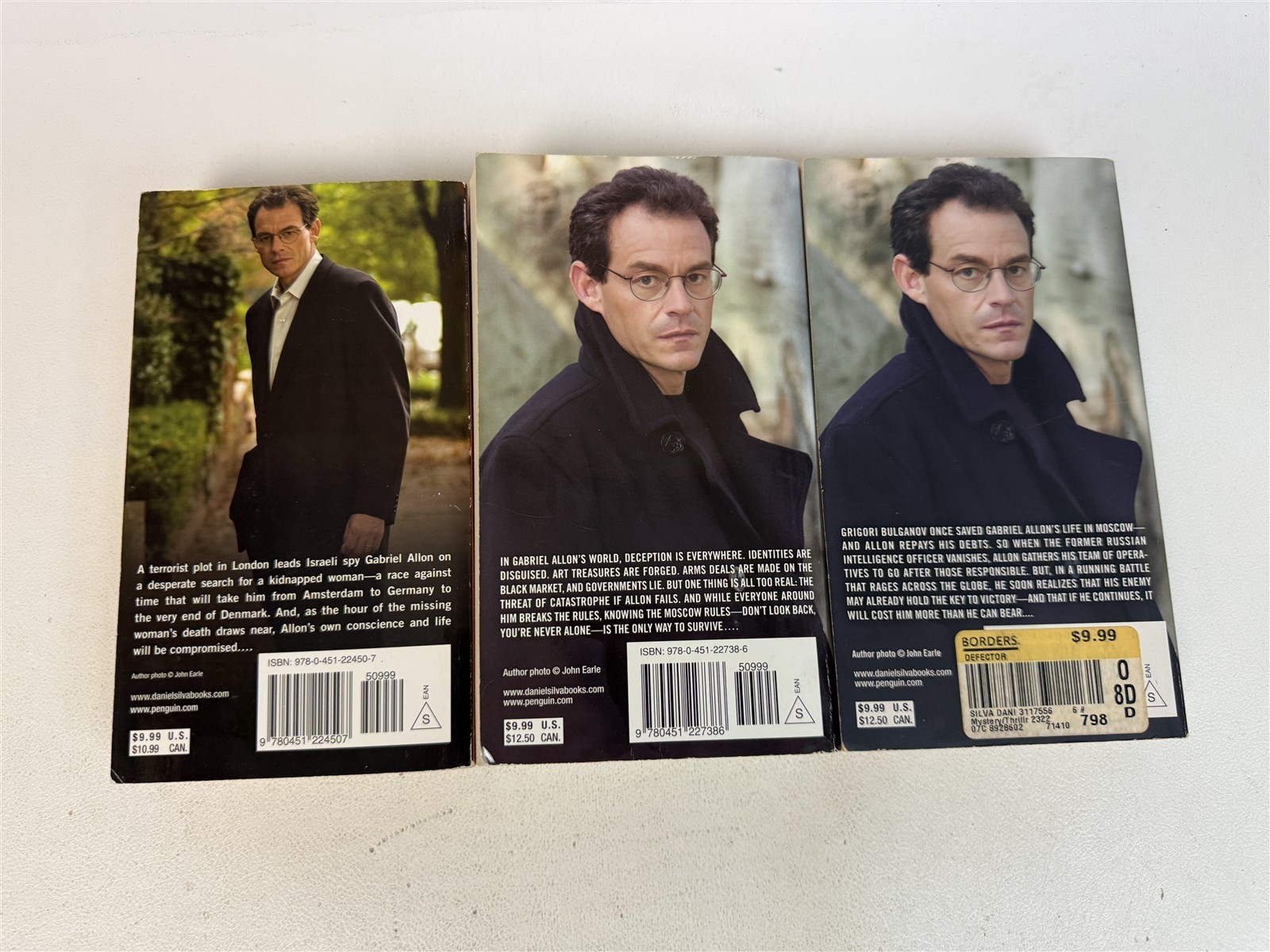 Daniel Silva Lot 23 Paperbacks including 20 Gabriel Allon series