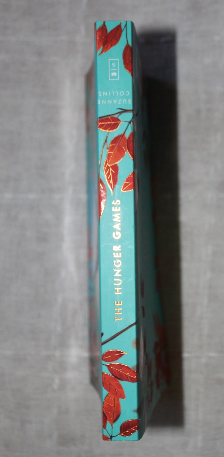The hunger games book 1 paperback deluxe edition